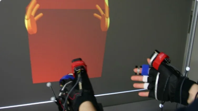 手全体に力覚を提示するグローブ型のインターフェースGhostGlove